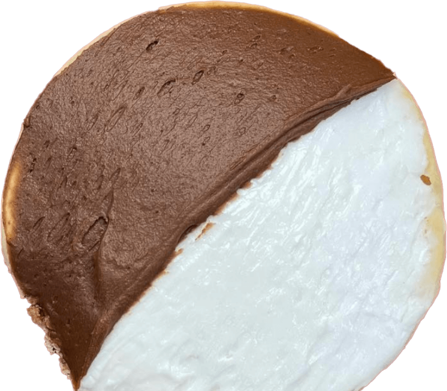 half moon cookie with chocolate and vanilla frosting